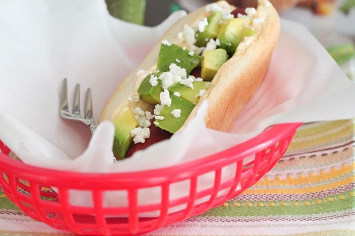 Avocado Topped Hot Dogs with Creamy Chipotle Sauce