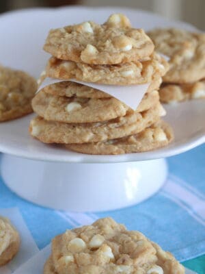 lemon cookies stacked on cake stand
