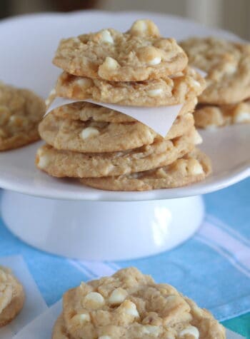 lemon cookies stacked on cake stand
