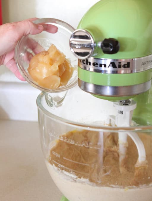 adding lemon curd to stand mixer for lemon cookies