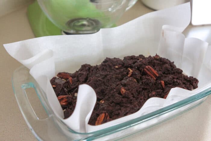 brownie batter added to baking dish
