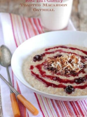 A bowl of red cherry toasted coconut oatmeal.