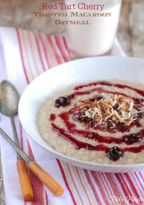 A bowl of red cherry toasted coconut oatmeal.