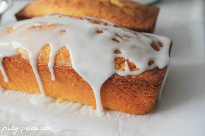 Iced Lemon Pound Cake covered in glaze.