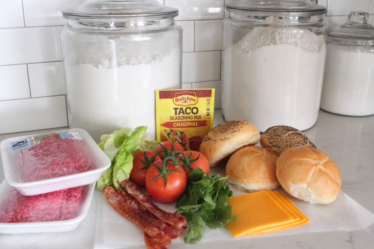 ingredients for bacon cheeseburgers on counter