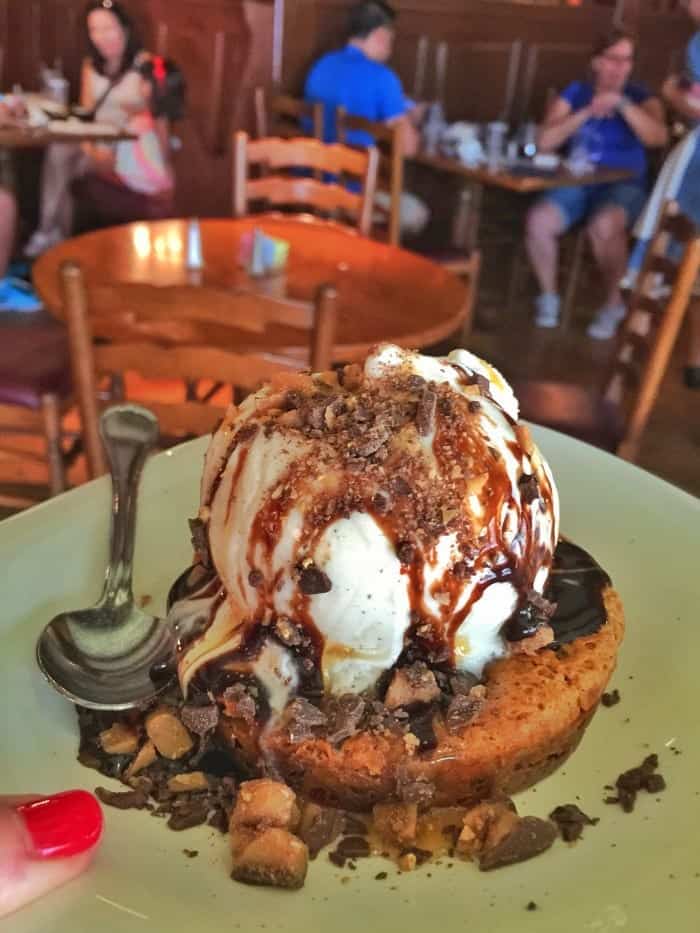 An Ooey Gooey Toffee Cake on a Green Plate at Liberty Tavern