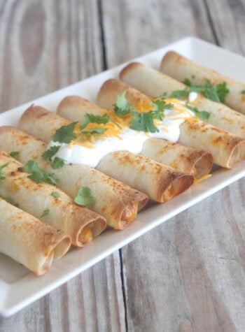 bean and cheese taquitos on serving plate