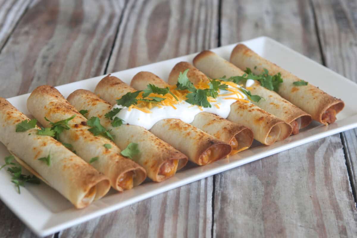 bean and cheese taquitos recipe on serving plate