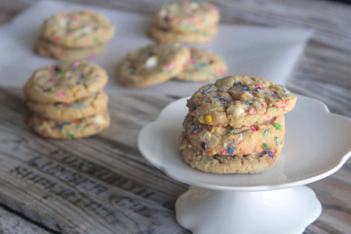funfetti cookies on cake stand