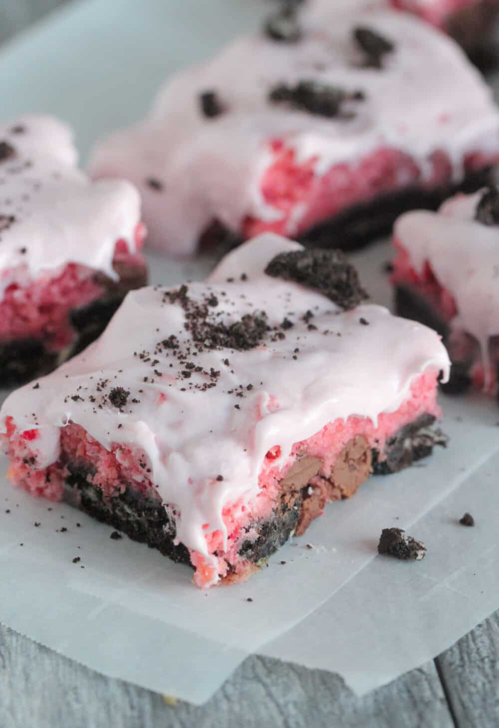strawberry cake bars on serving plate