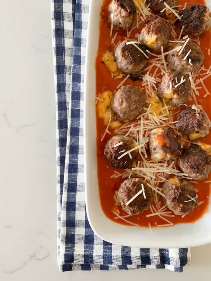 Cheddar Stuffed Homemade Meatballs on serving plate