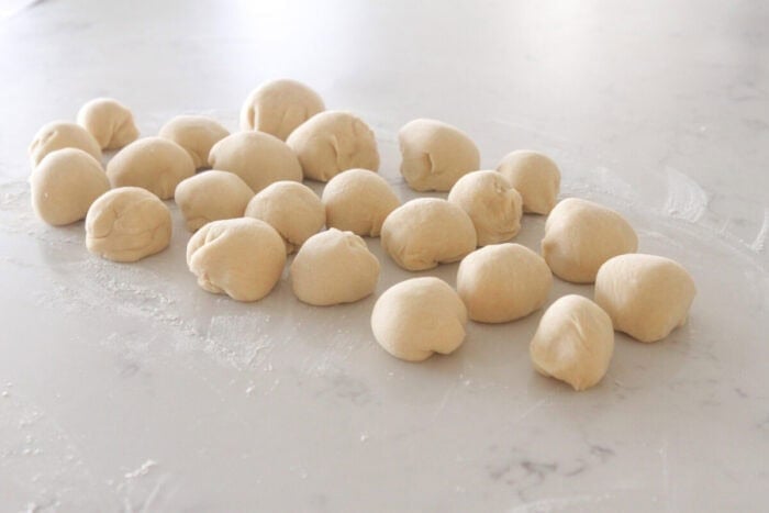 cinnamon roll dough rolled into balls