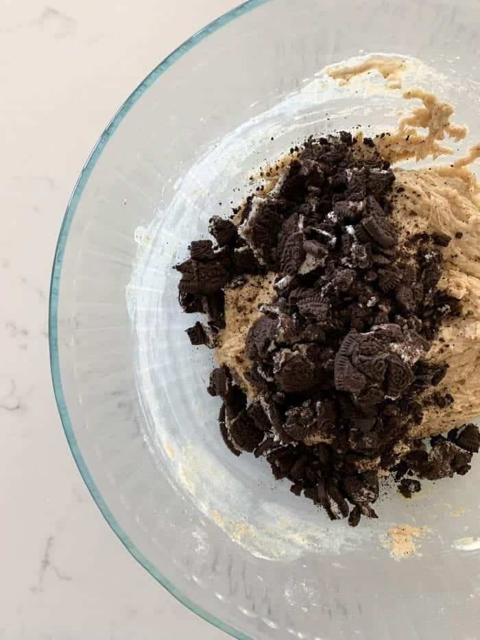 crushed oreos added to mixing bowl