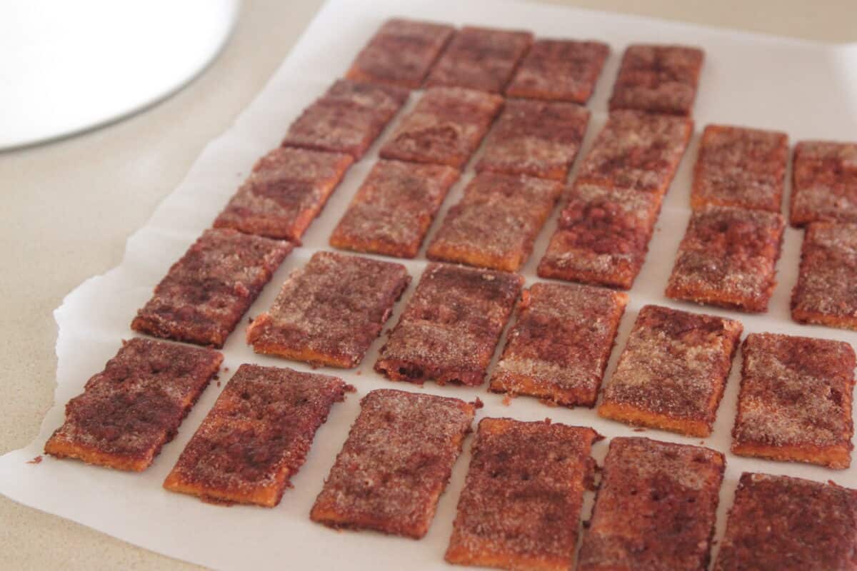 baked churro crack crackers on parchment paper