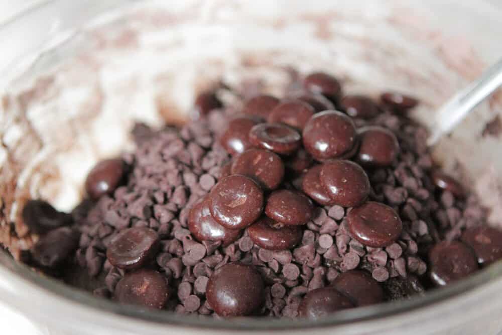 junior mints and chocolate chips in mixing bowl 