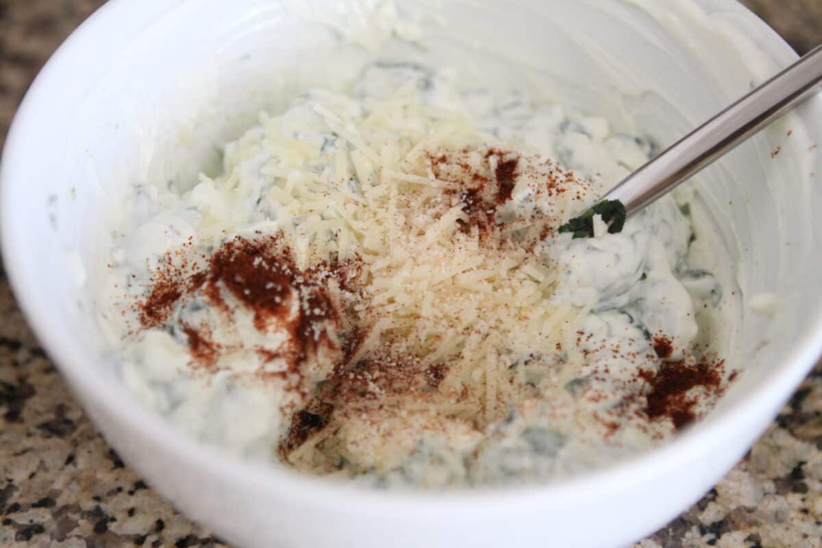 spinach dip recipe ingredients in mixing bowl