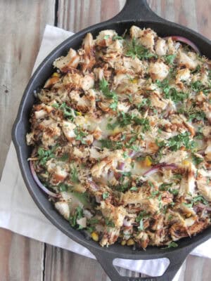 bbq chicken and rice bake served in cast iron skillet
