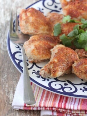 baked chicken thighs on serving plate