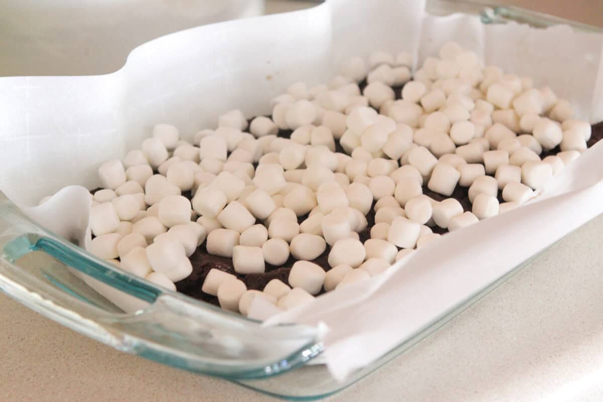 marshmallows added to chocolate dough layer