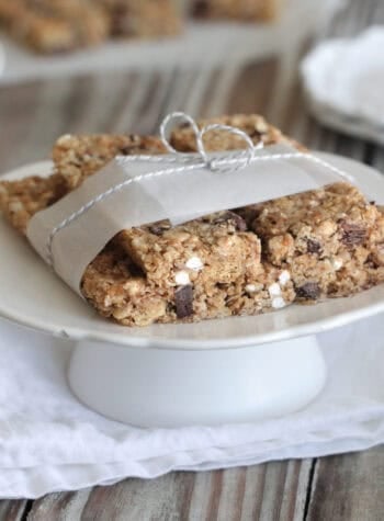 homemade granola bars stacked on cake stand