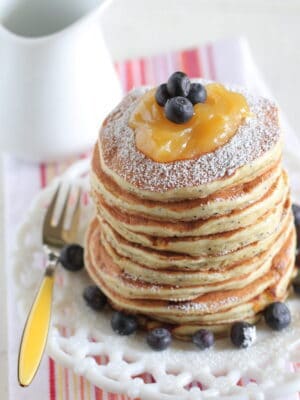stack of lemon ricotta pancakes on plate