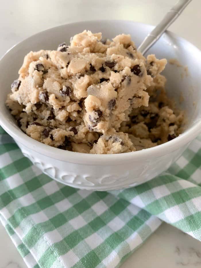 A spoon scooping homemade cookie dough