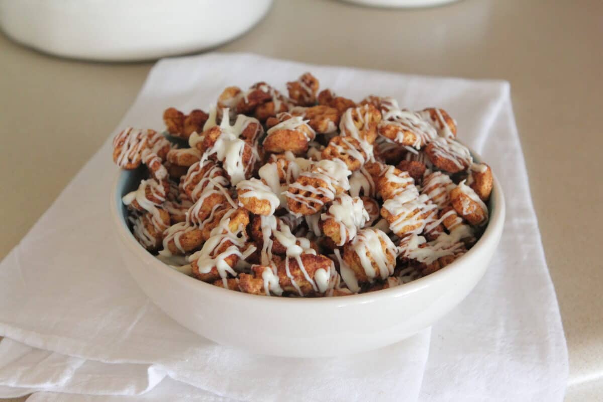 churro snack mix in serving bowl on napkin