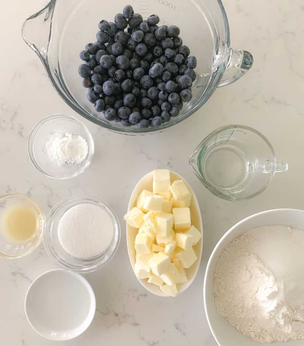 ingredients for blueberry pie on counter