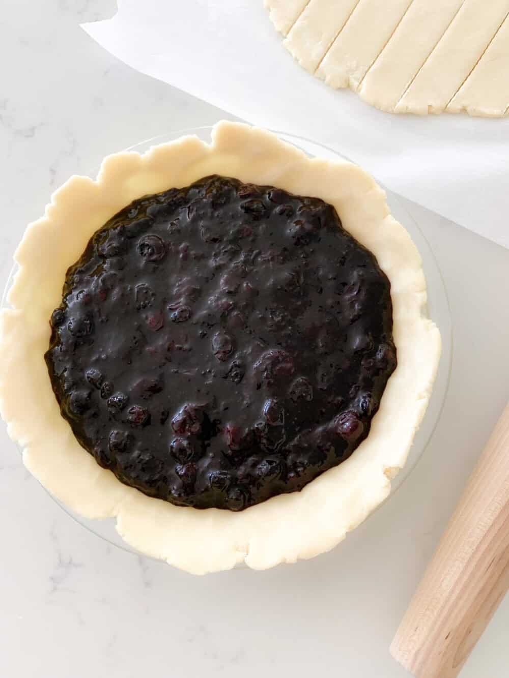 blueberry pie filling inside pie crust