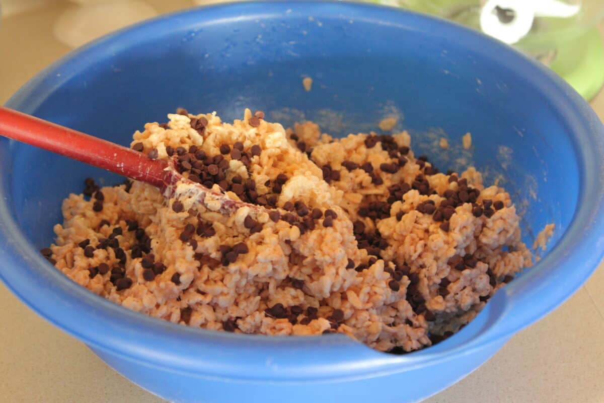 chocolate chips added to mixing bowl of rice krispie treats