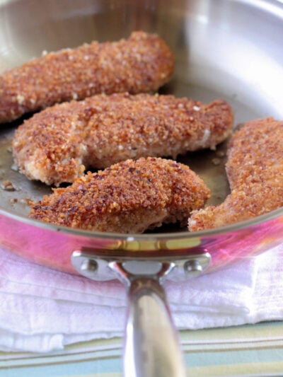 parmesan pecan chicken tenders in skillet