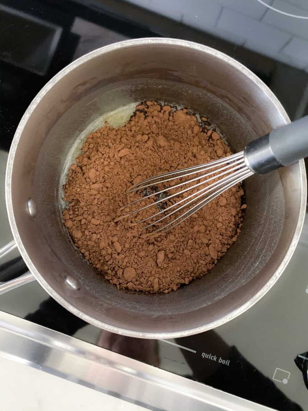 chocolate in mixing bowl for homemade chocolate frosting