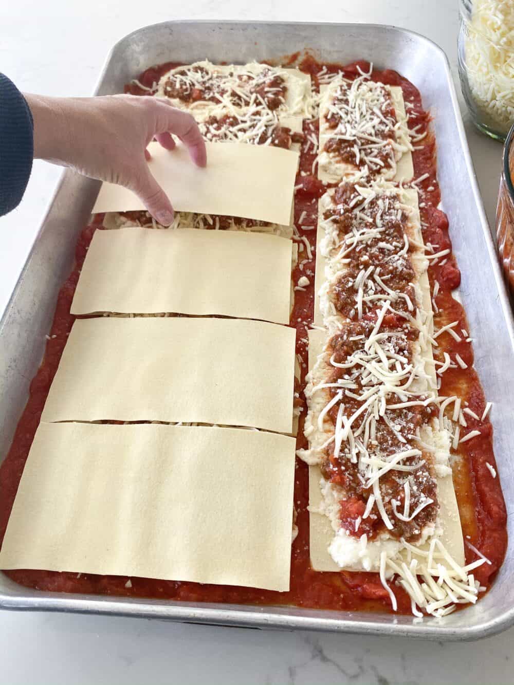 layering noodles for easy lasagna recipe