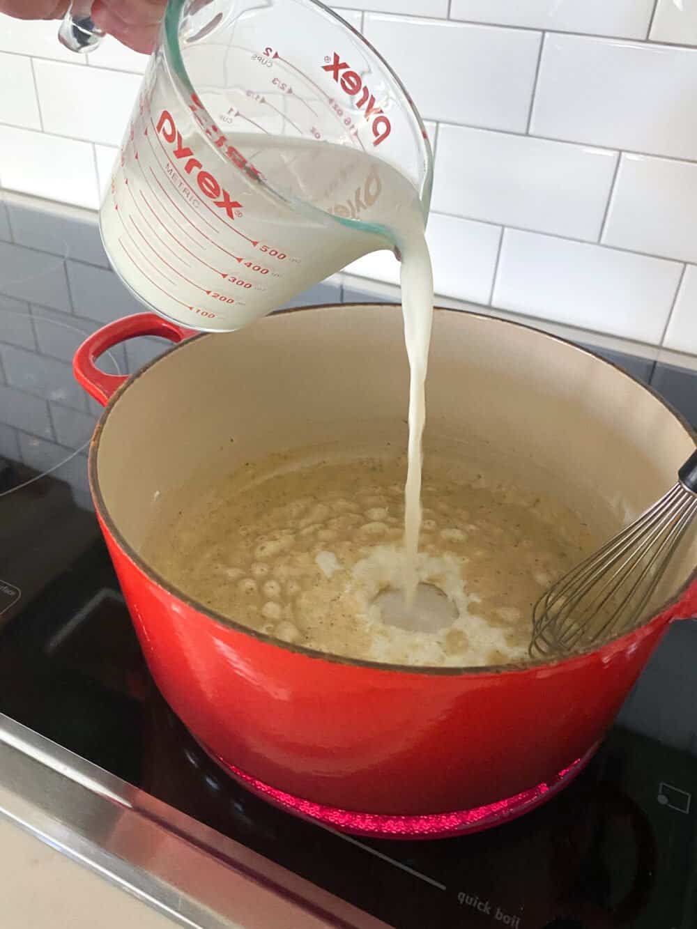 adding milk to roux for homemade mac and cheese