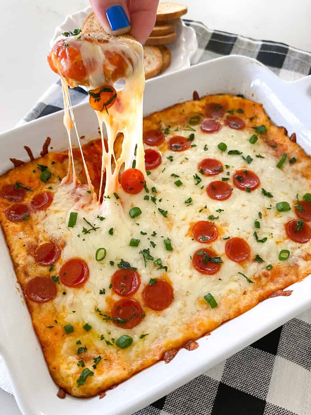 baked pizza dip in baking dish