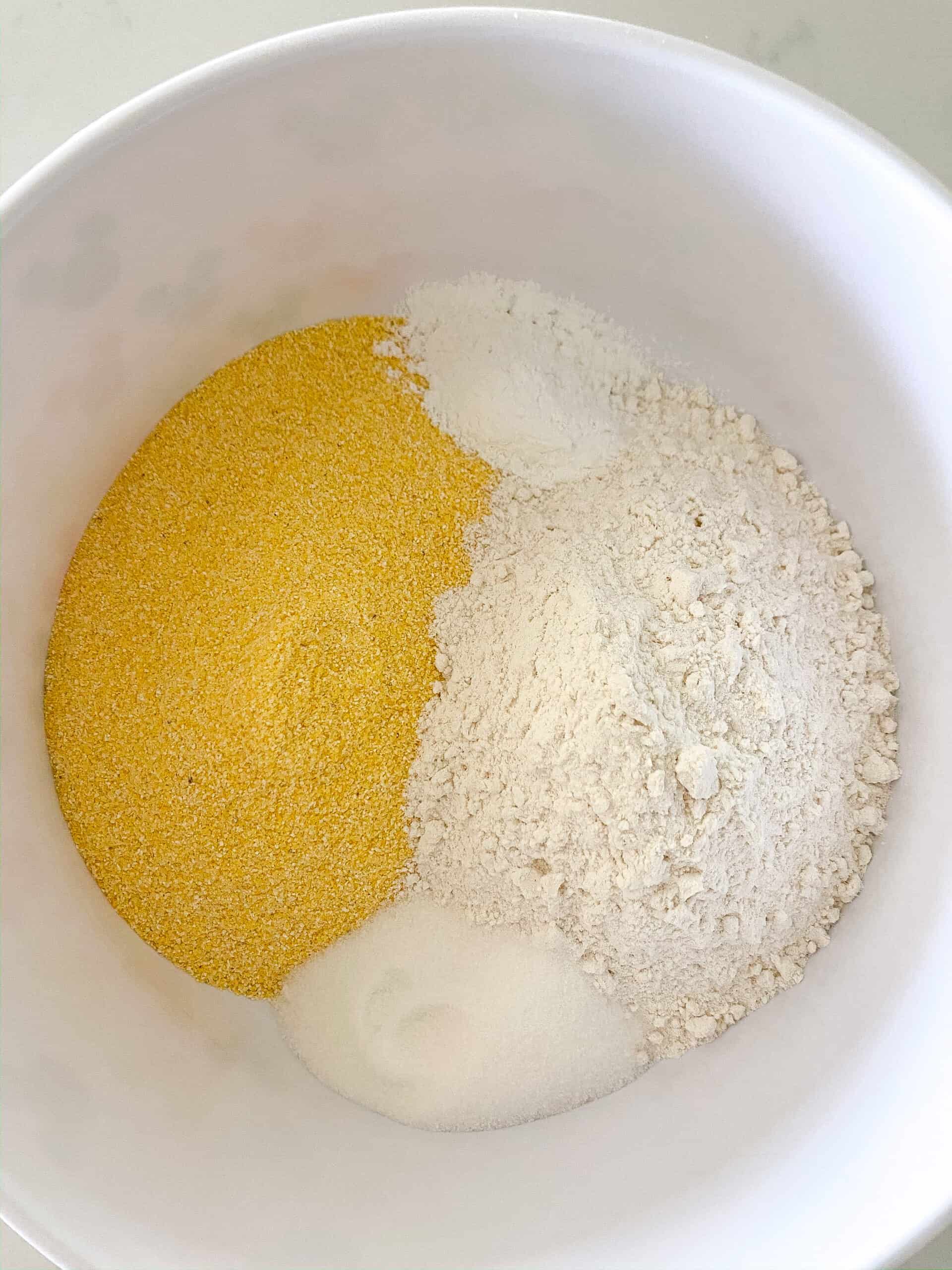corn dog recipe dry ingredients in mixing bowl