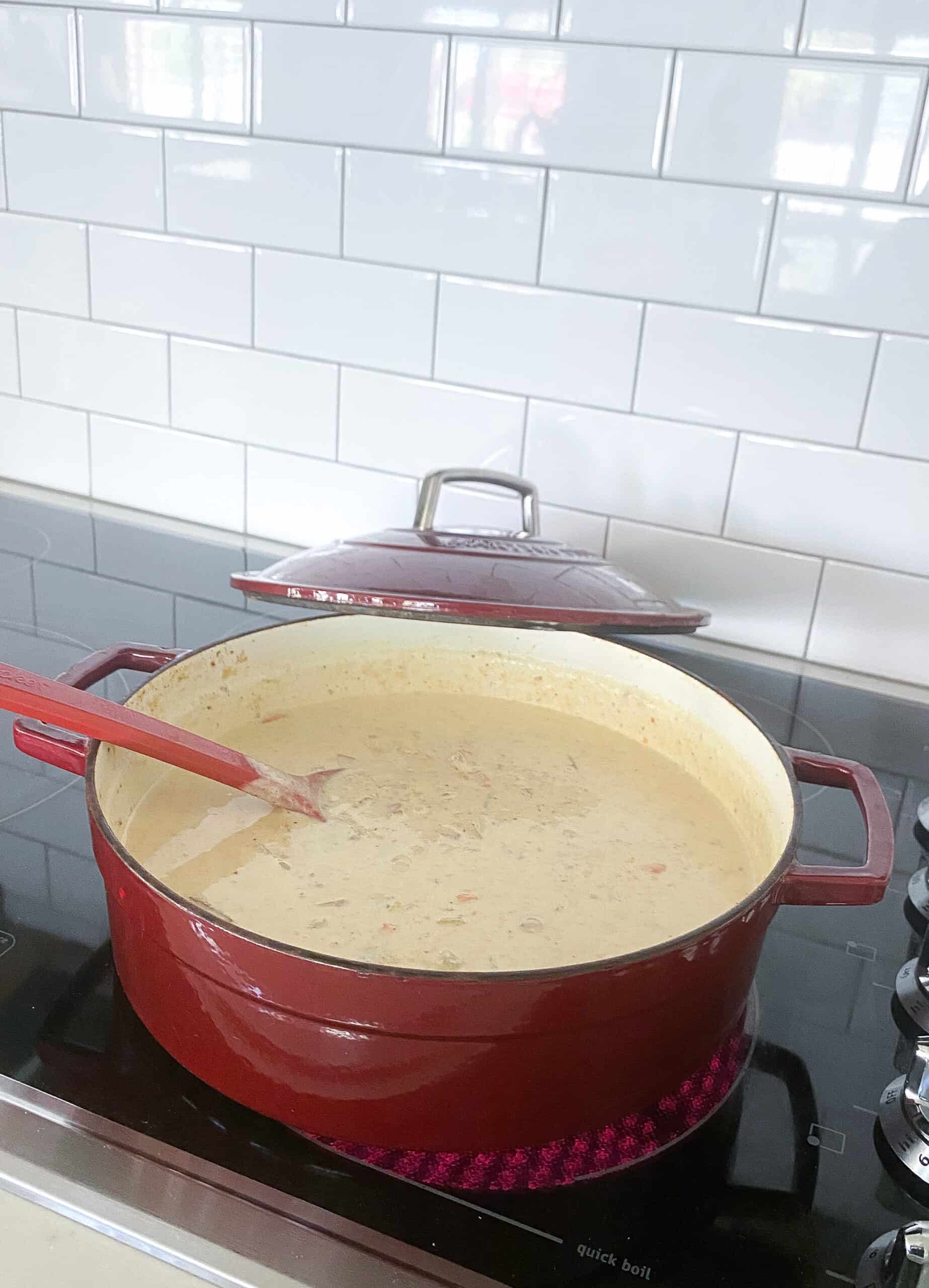 simmering loaded baked potato soup