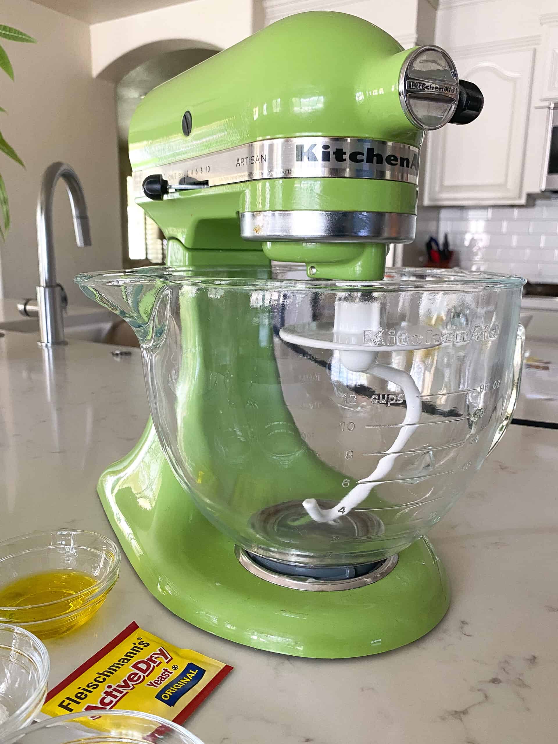 stand mixer with dough hook attached for pizza dough recipe