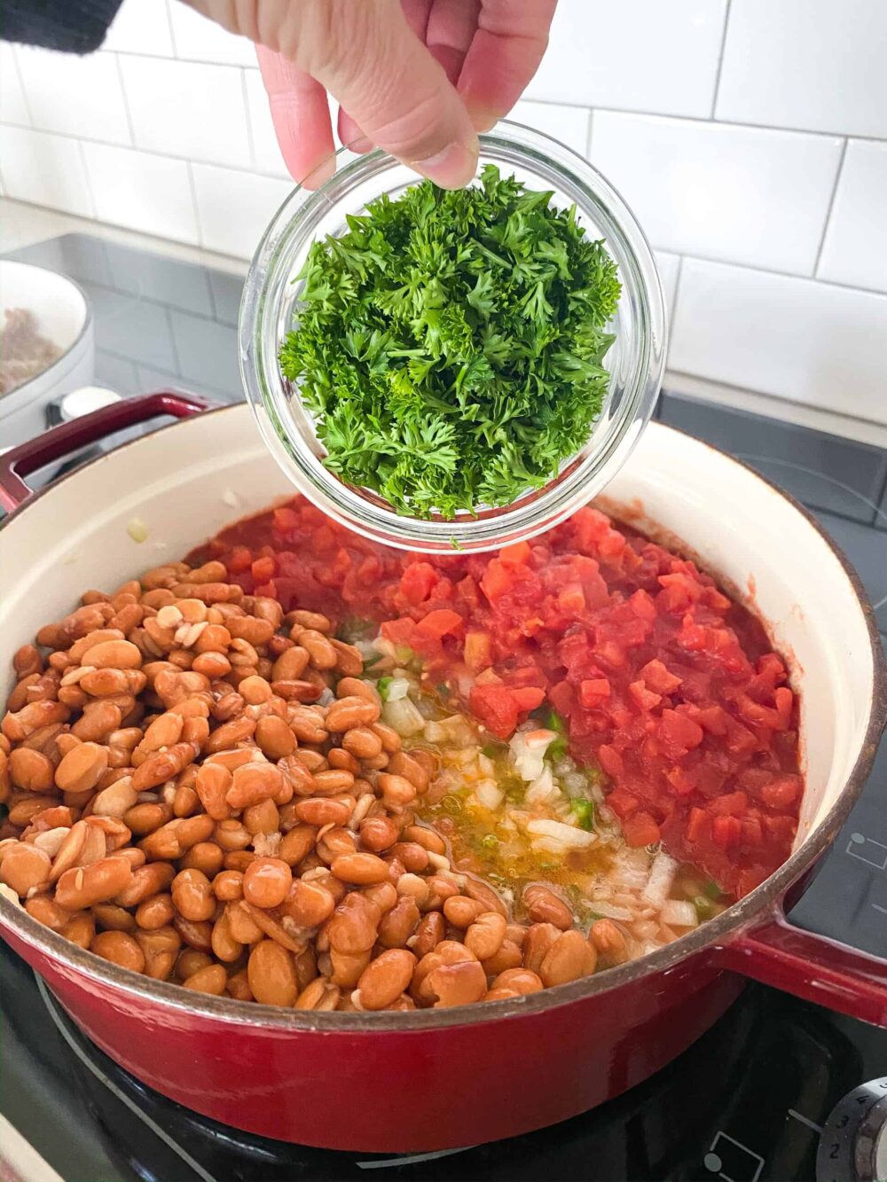 add beans tomatoes and parsley to pot for chili recipe