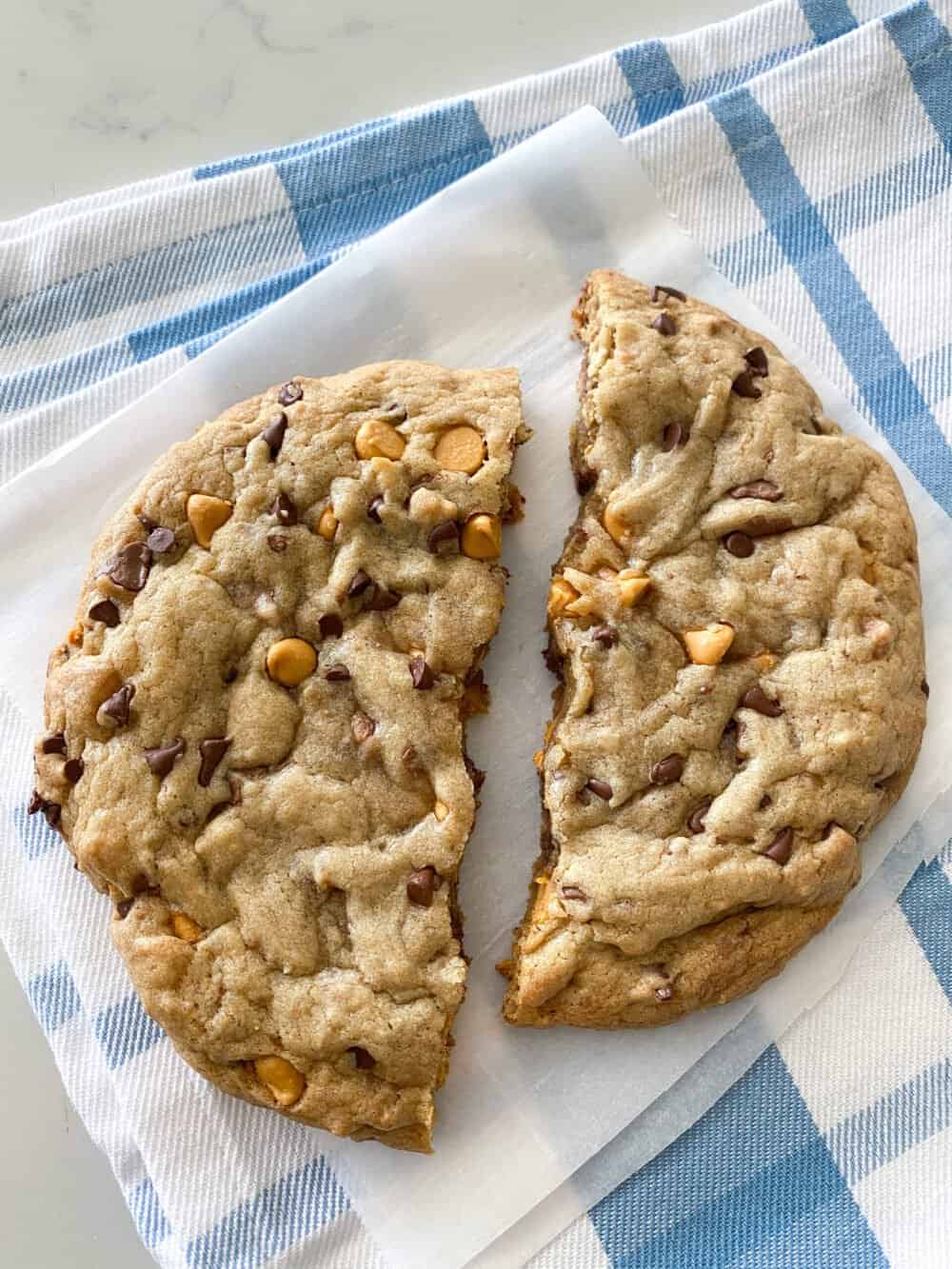 giant chocolate chip cookie cut in half