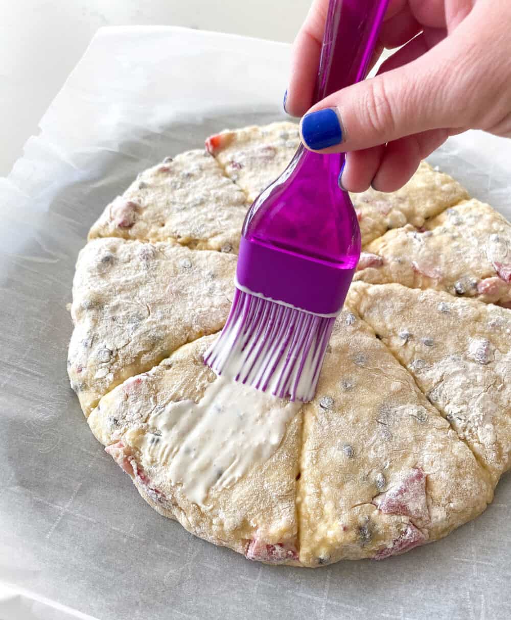 use pizza cutter to cut scone dough into wedges