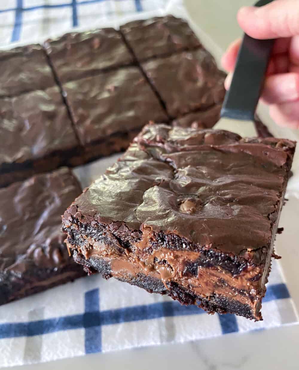 baked nutella brownies cut into squares