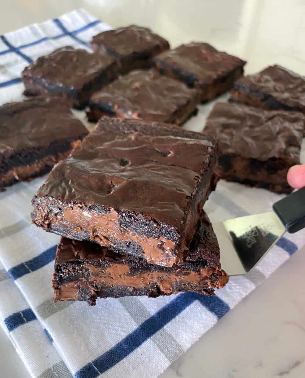 baked nutella brownies cut into squares