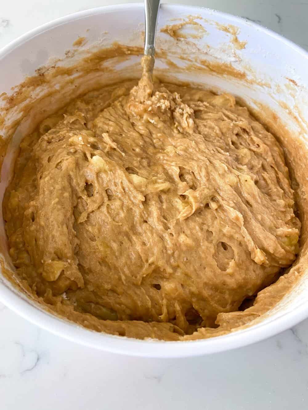 banana bread muffin batter in mixing bowl