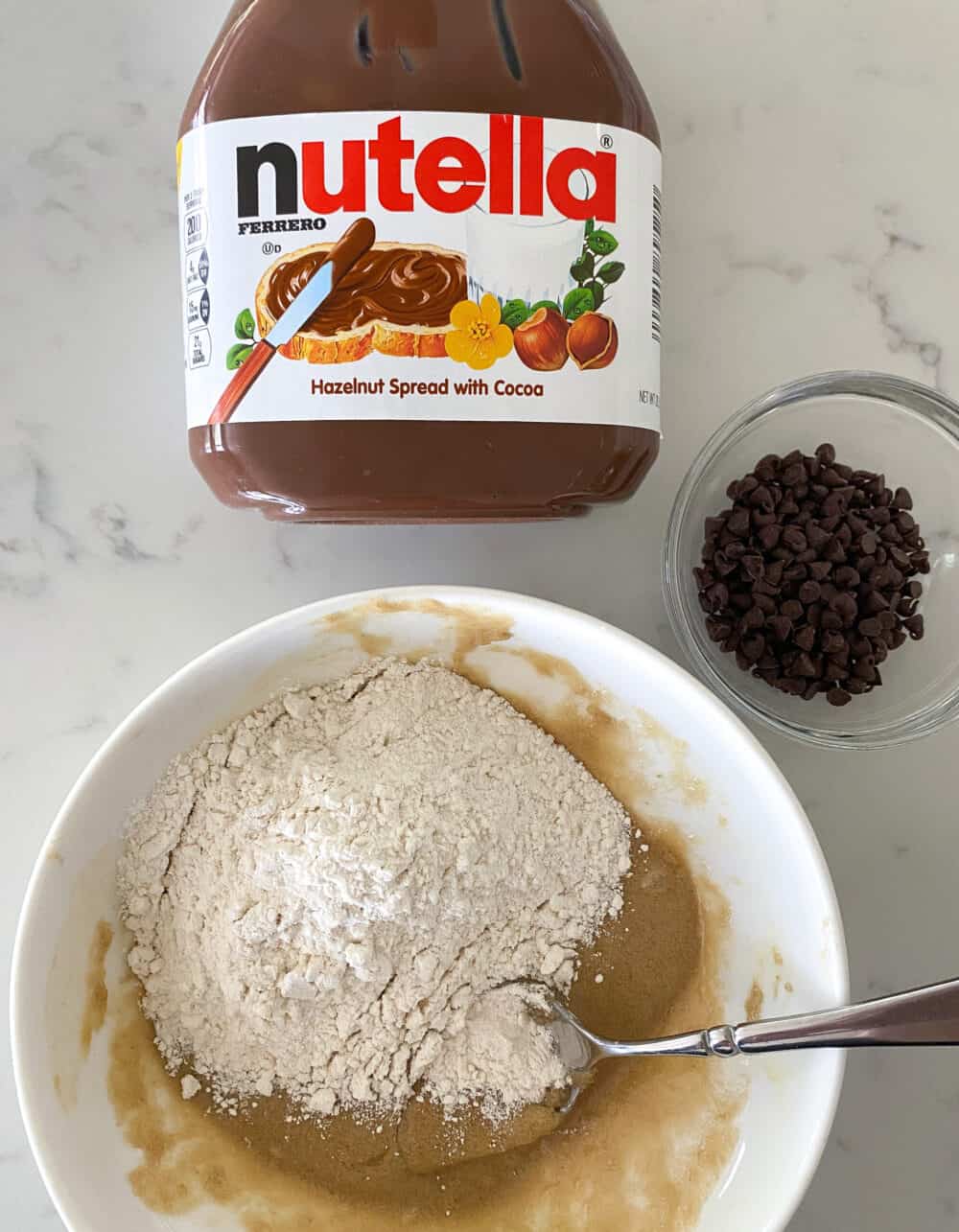 mixing bowl with ingredients inside for nutella cookies