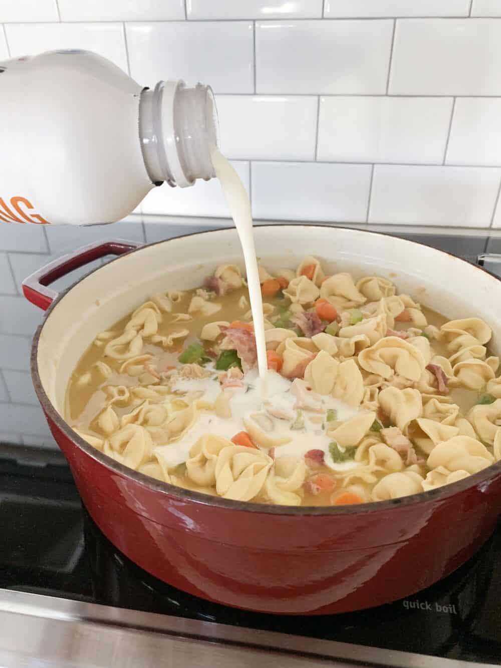 heavy cream added to soup pot