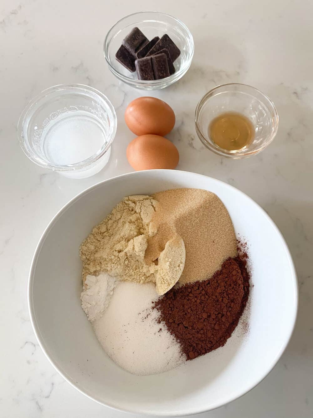 keto brownies dry ingredients in mixing bowl