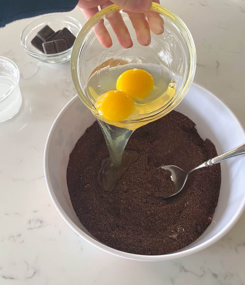 wet ingredients added to mixing bowl for keto brownies