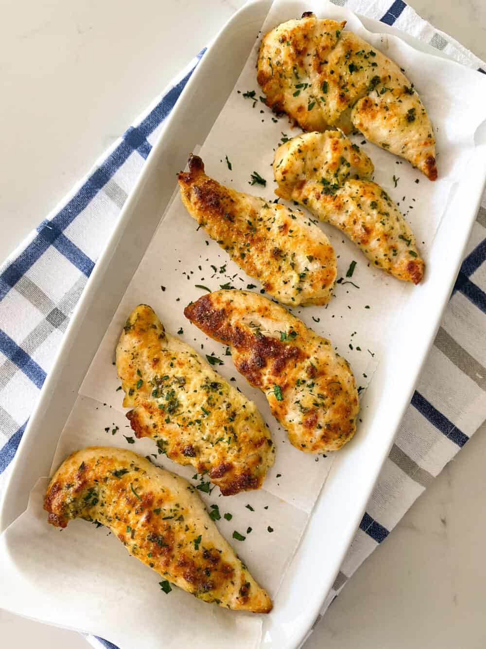 finished baked chicken tenders on serving plate