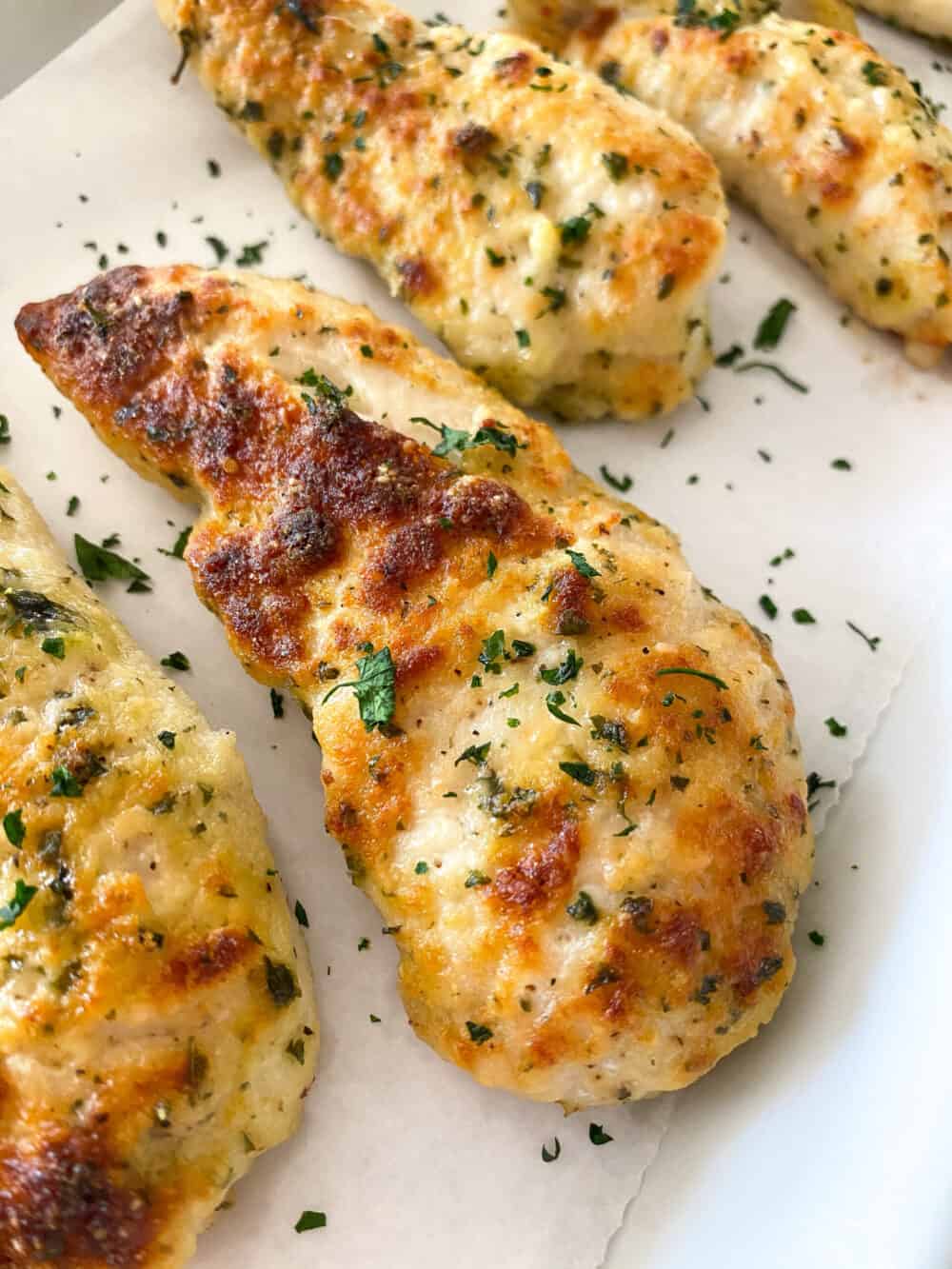 baked chicken tenders on serving plate